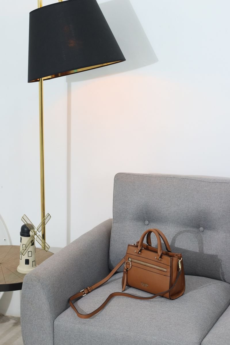 Leather handbag on an armchair