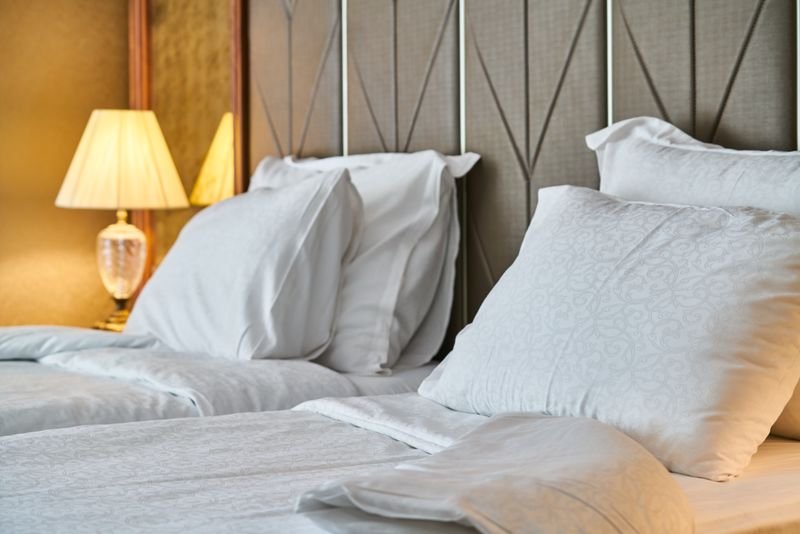 Fresh bed sheets and pillows